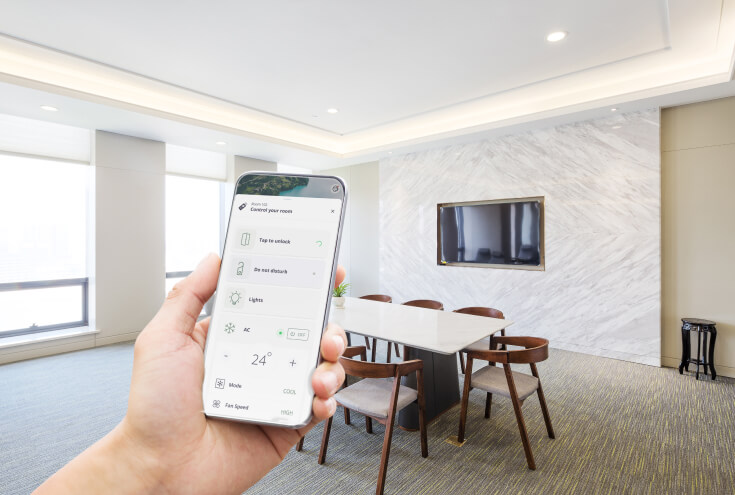 Mobile phone in modern meeting room