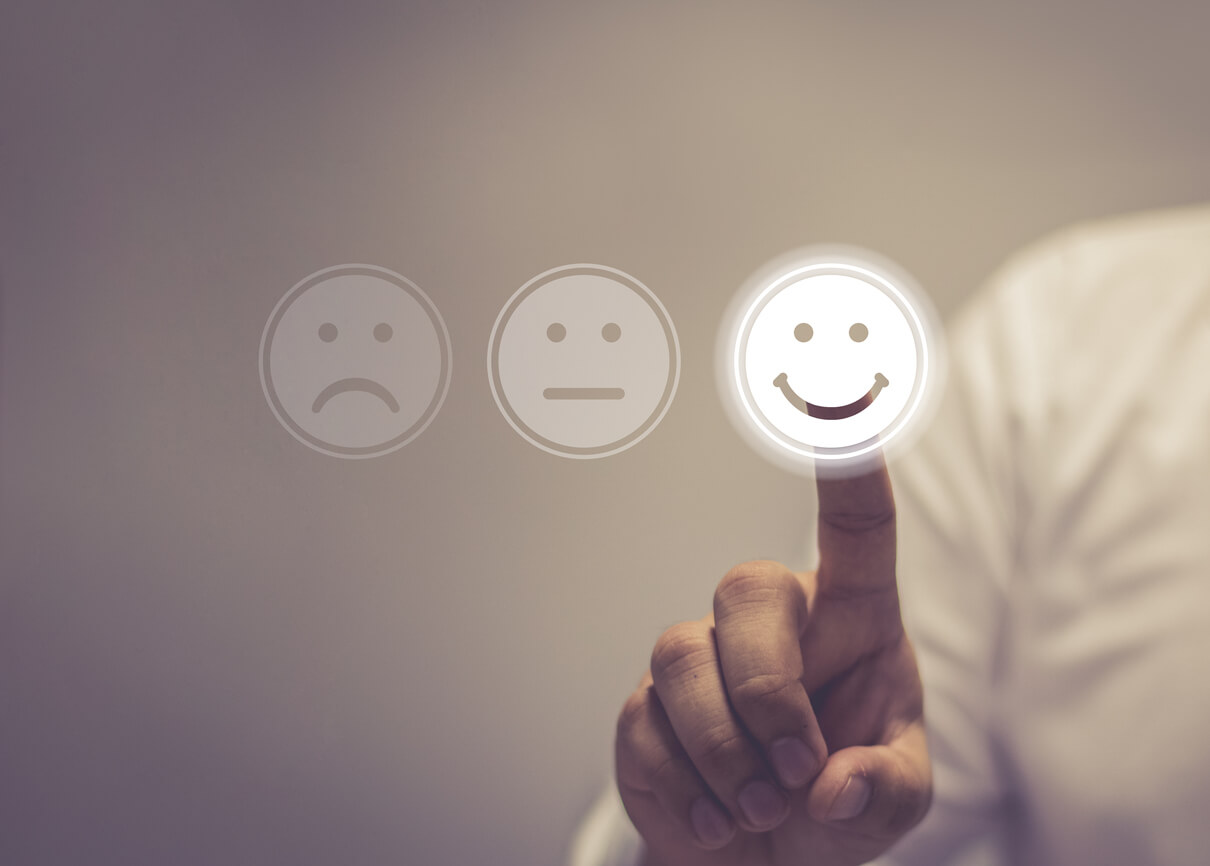 finger picks smiling face